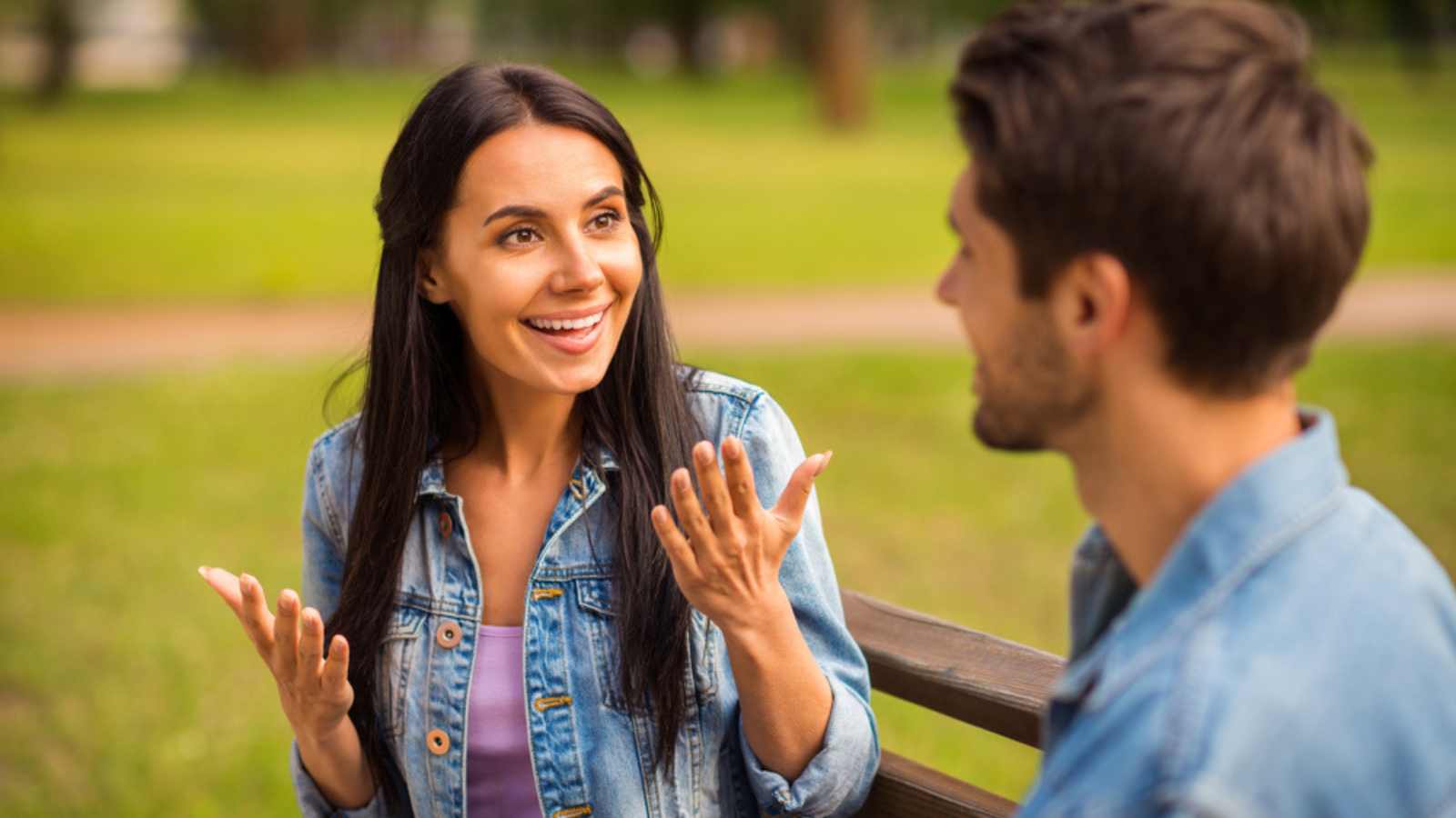 Woman engaging in talk with boy friend