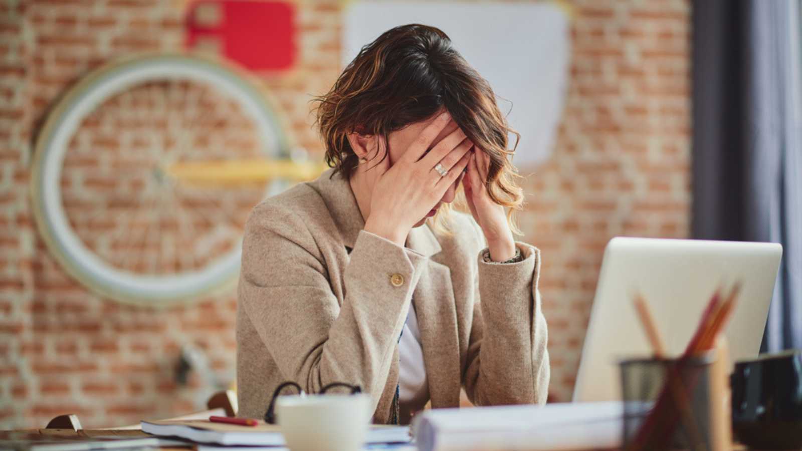 Woman stressed in office