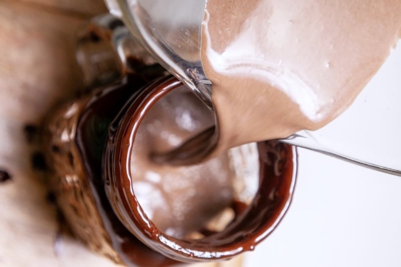 pour chocolate shake into freakshake glass